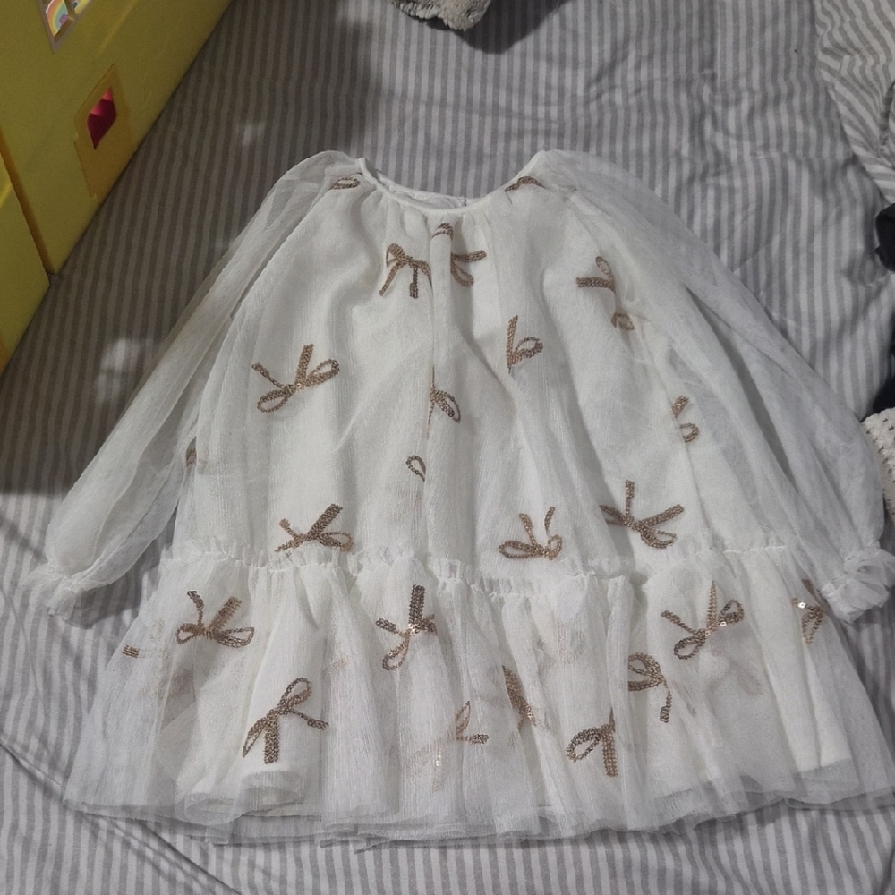 White Dress with Gold Bow Accents